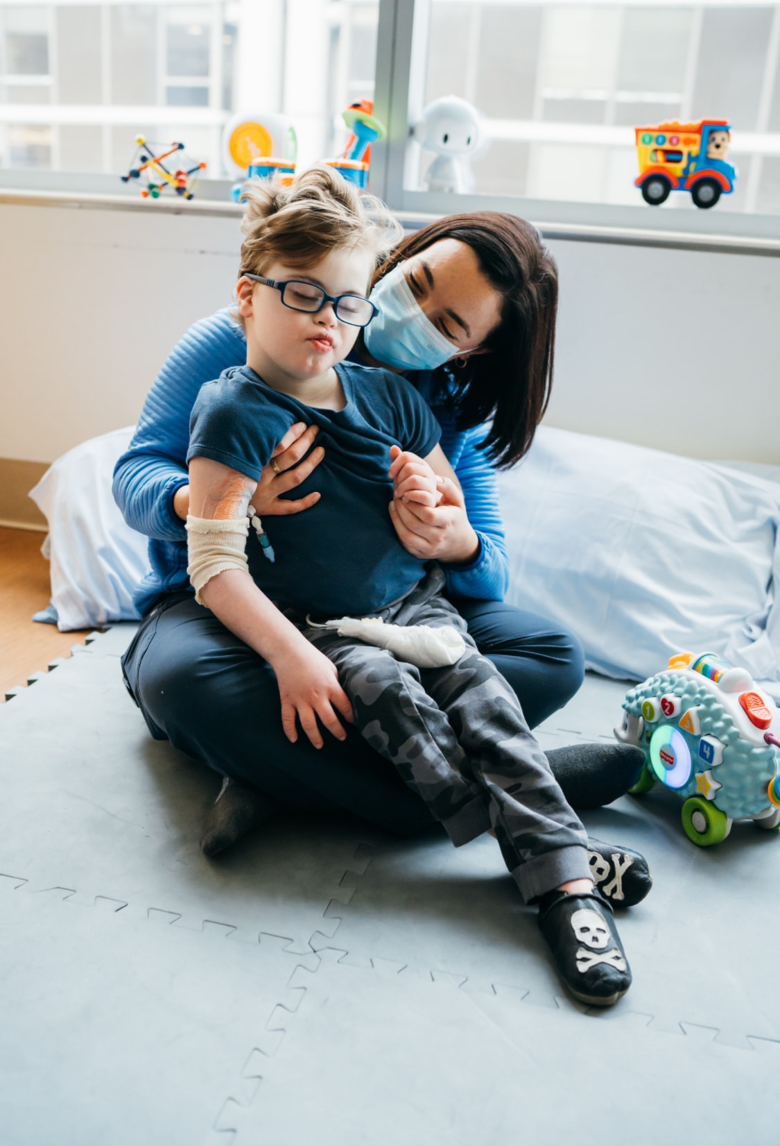 Oscar with a caregiver at the hospital